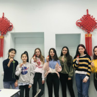 Chinese knot weaving activity at Confucius Classroom in Riga 34 Secondary School